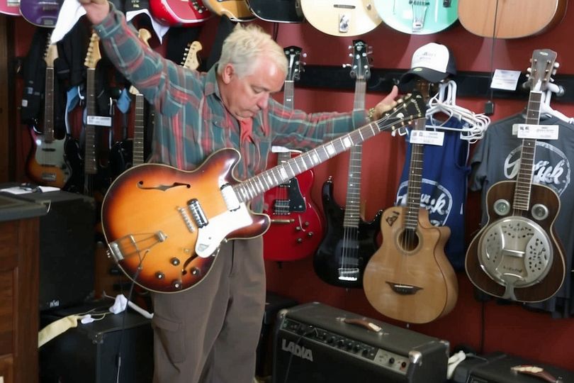 An 81-year-old grandfather enters a guitar store, takes one of them and starts playing